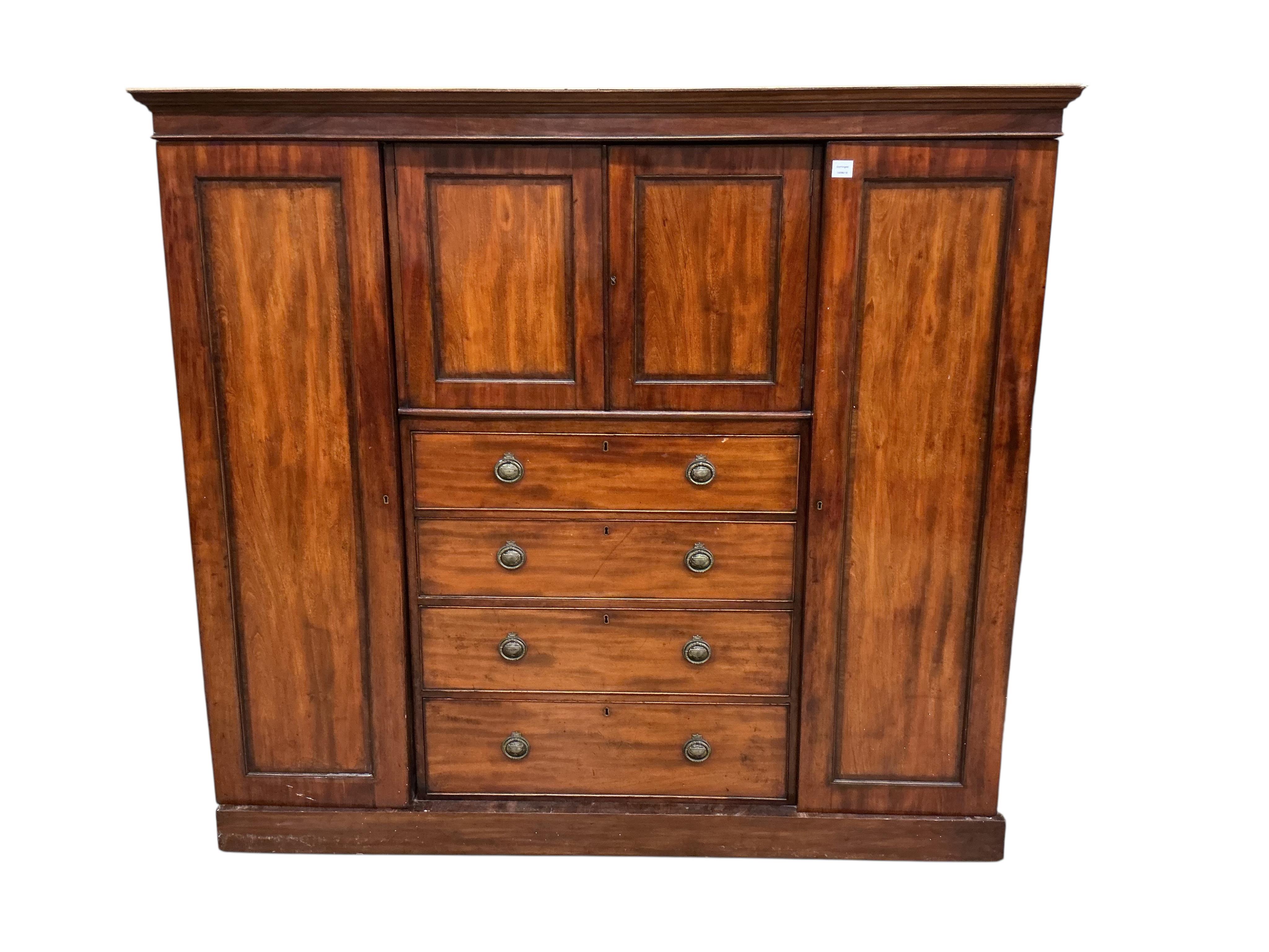 A Victorian mahogany compactum wardrobe, width 188cm, depth 52cm, height 170cm
